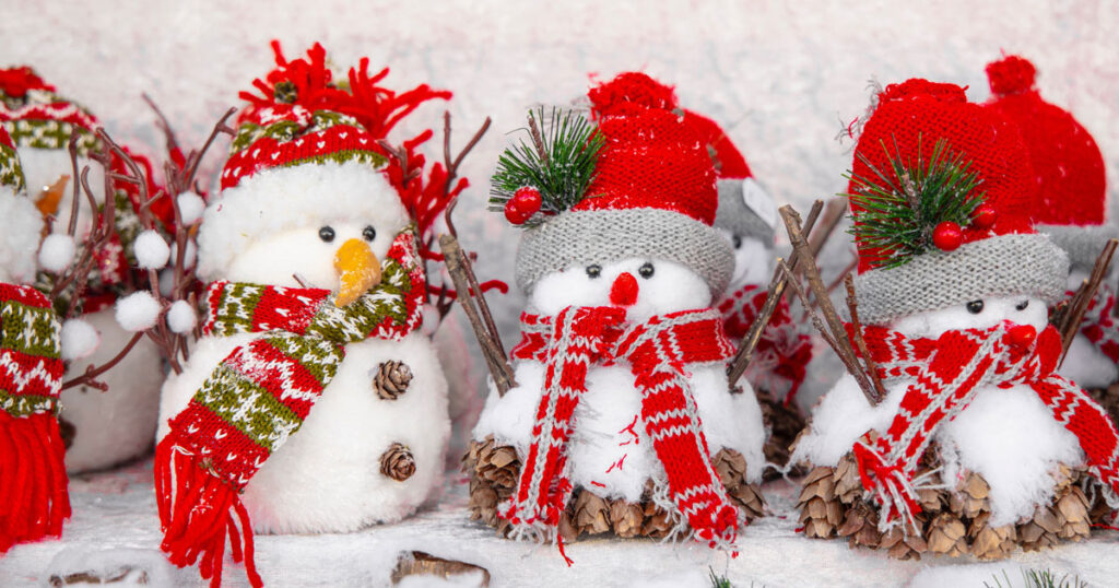 Row of handmade snowmen for the Carers Christmas Fair Kendal